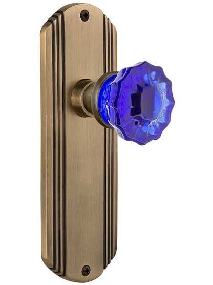 Streamline Deco Door Set with Colored Fluted Crystal Glass Knobs Cobalt Blue in Antique Brass.